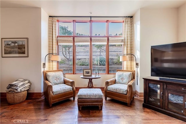 26525 Carancho Rd, Temecula, CA 92590 - living area featuring healthy amount of natural light, wood finished floors, and baseboards