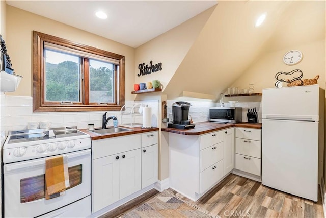 26525 Carancho Rd, Temecula, CA 92590 - kitchen with white appliances, wood counters, open shelves, a sink, and decorative backsplash