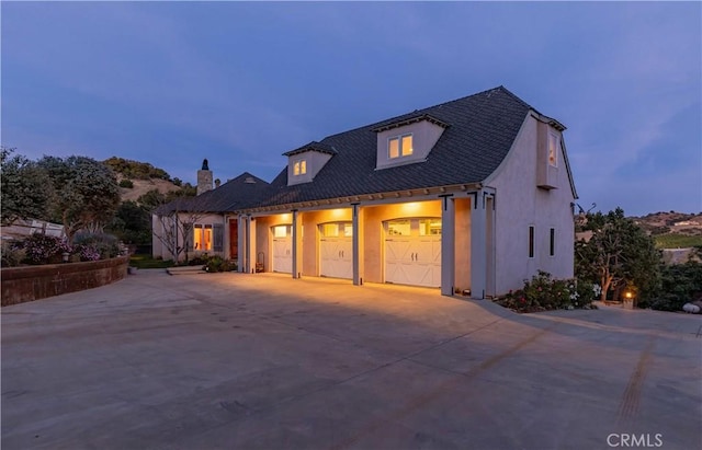 26525 Carancho Rd, Temecula, CA 92590 - view of front of house featuring concrete driveway, an attached garage, and stucco siding