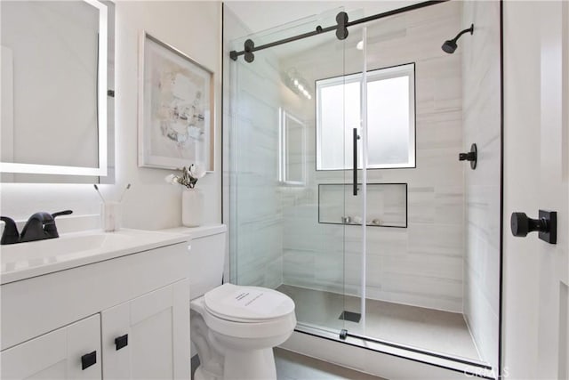 17805 Winterberry St, Fountain Valley, CA 92708 - full bath with vanity, a stall shower, toilet, and a baseboard radiator