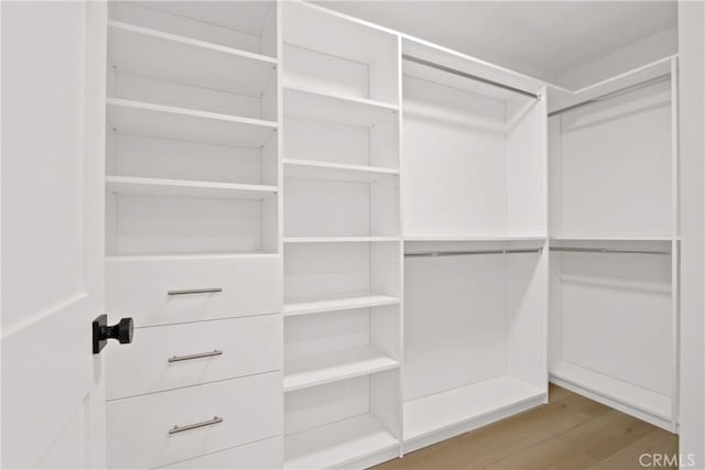 17805 Winterberry St, Fountain Valley, CA 92708 - walk in closet featuring wood finished floors