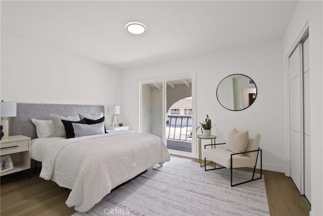 17805 Winterberry St, Fountain Valley, CA 92708 - bedroom featuring access to outside and wood finished floors