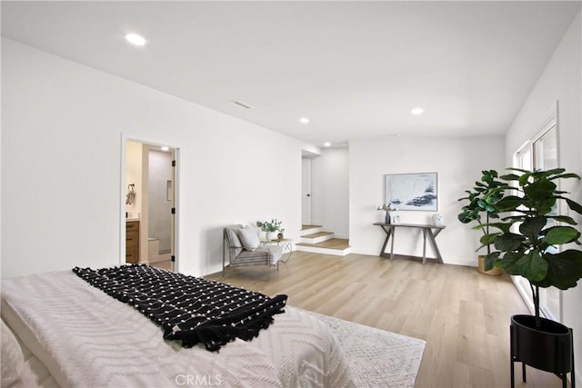 17805 Winterberry St, Fountain Valley, CA 92708 - bedroom featuring light wood-style flooring, recessed lighting, and baseboards