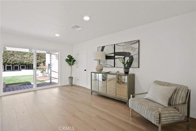 17805 Winterberry St, Fountain Valley, CA 92708 - living area featuring wood finished floors, recessed lighting, and baseboards