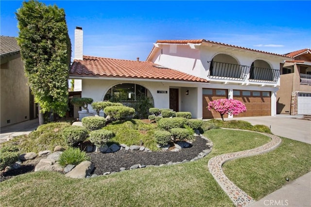 17805 Winterberry St, Fountain Valley, CA 92708 - mediterranean / spanish-style home with an attached garage, driveway, stucco siding, a tiled roof, and a chimney
