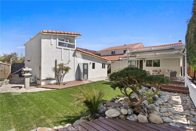 17805 Winterberry St, Fountain Valley, CA 92708 - back of house featuring an outdoor living space, a deck, a pergola, and a tile roof