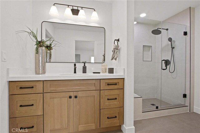 17805 Winterberry St, Fountain Valley, CA 92708 - bathroom featuring vanity, a stall shower, tile patterned floors, and baseboards