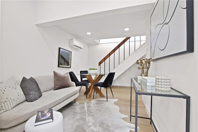 17805 Winterberry St, Fountain Valley, CA 92708 - living room with a wall mounted air conditioner, wood finished floors, stairway, and recessed lighting