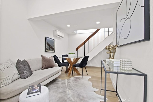 17805 Winterberry St, Fountain Valley, CA 92708 - living room featuring a wall mounted air conditioner, wood finished floors, stairway, and recessed lighting