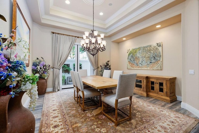 30801 Via Conquista, San Juan Capistrano, CA 92675 - dining space featuring a chandelier, wood finished floors, baseboards, crown molding, and recessed lighting