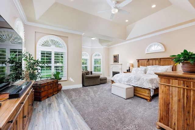 30801 Via Conquista, San Juan Capistrano, CA 92675 - bedroom with ornamental molding, a tray ceiling, ceiling fan, recessed lighting, and baseboards