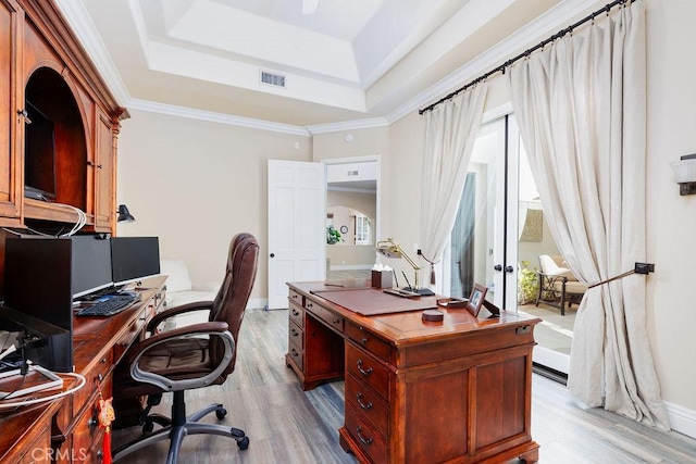 30801 Via Conquista, San Juan Capistrano, CA 92675 - home office with a tray ceiling, light wood finished floors, baseboards, and ornamental molding