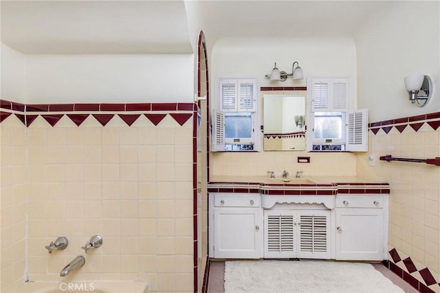 209 Ximeno Ave, Long Beach, CA 90803 - full bath with vanity, a tub, and tile walls