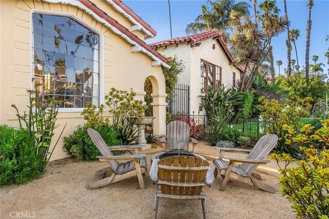 209 Ximeno Ave, Long Beach, CA 90803 - view of patio featuring an outdoor fire pit