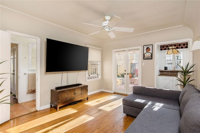 209 Ximeno Ave, Long Beach, CA 90803 - living area with french doors, a ceiling fan, wood finished floors, and baseboards