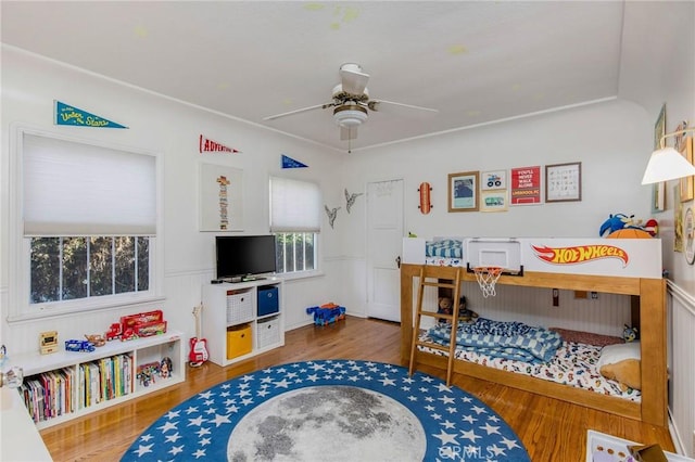 209 Ximeno Ave, Long Beach, CA 90803 - bedroom with wainscoting, wood finished floors, and a ceiling fan