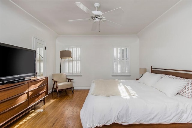 209 Ximeno Ave, Long Beach, CA 90803 - bedroom with wood finished floors, baseboards, and a ceiling fan
