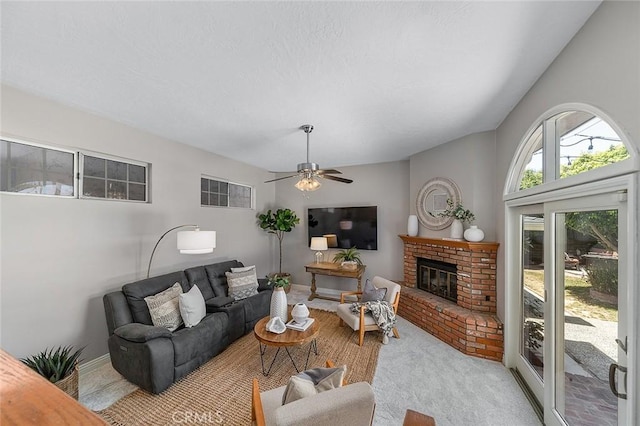 435 Orlena Ave, Long Beach, CA 90814 - living area featuring light colored carpet, ceiling fan, and a fireplace