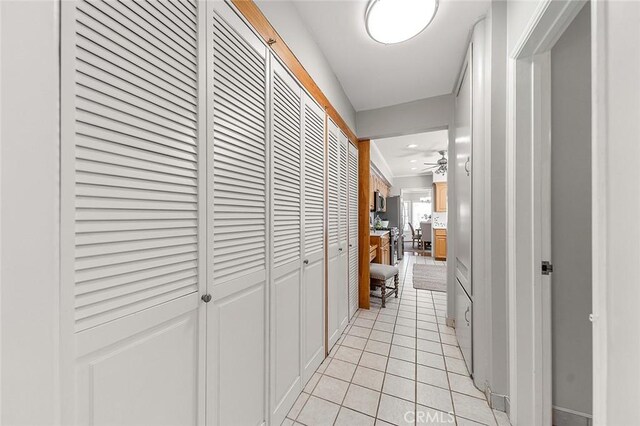 435 Orlena Ave, Long Beach, CA 90814 - corridor with light tile patterned floors and a desk
