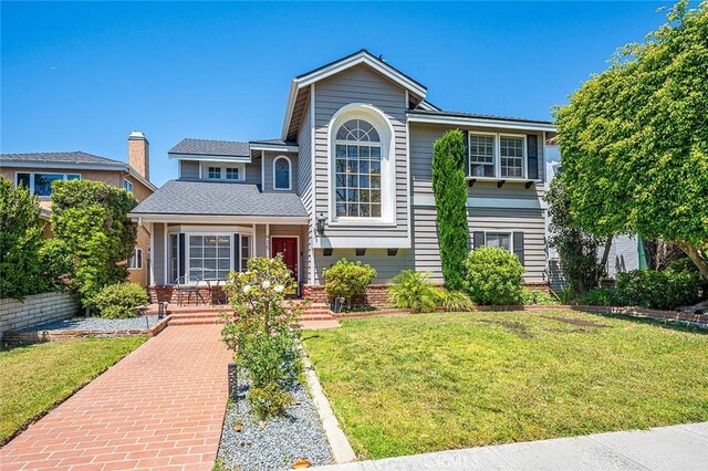 435 Orlena Ave, Long Beach, CA 90814 - view of front facade with a front lawn