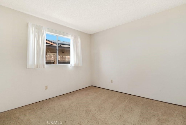 2740 Whitney St, San Diego, CA 92111 - carpeted empty room with a textured ceiling