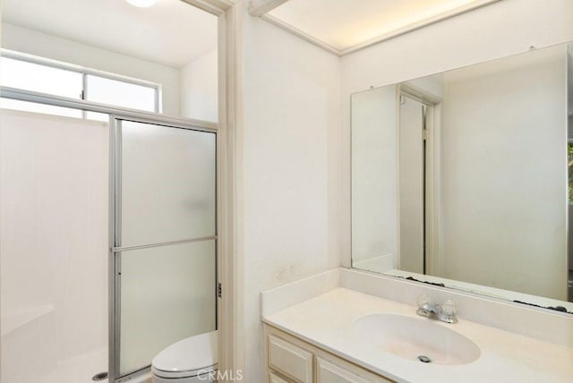 2740 Whitney St, San Diego, CA 92111 - full bathroom with vanity, a shower stall, and toilet