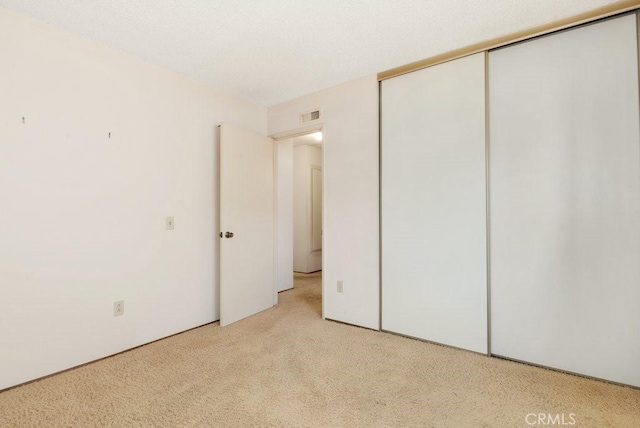 2740 Whitney St, San Diego, CA 92111 - unfurnished bedroom with a closet and carpet floors