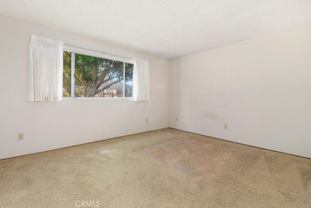 2740 Whitney St, San Diego, CA 92111 - empty room with carpet and a textured ceiling