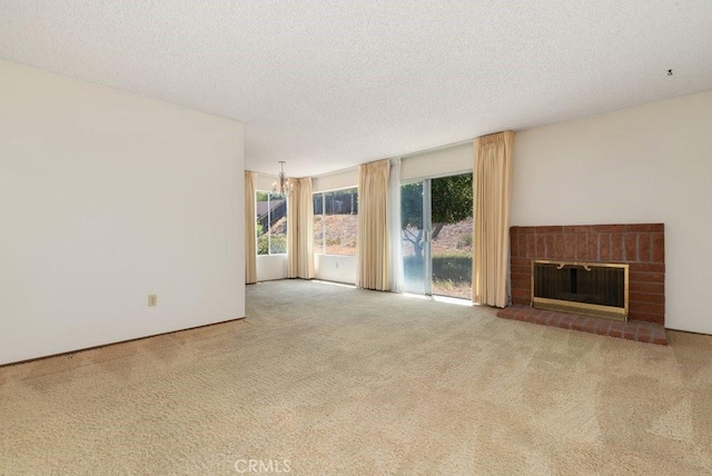 2740 Whitney St, San Diego, CA 92111 - unfurnished living room with carpet flooring, a fireplace, and a textured ceiling