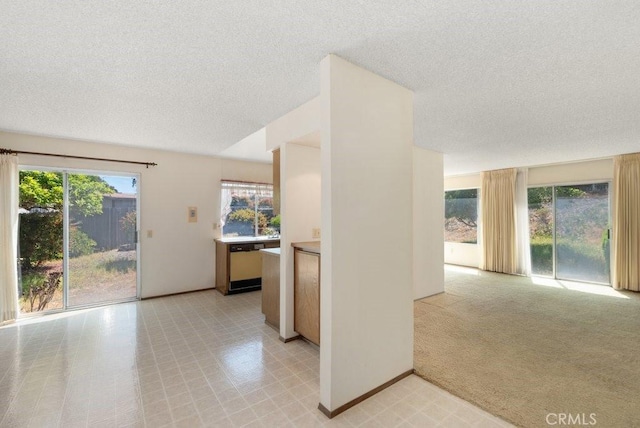 2740 Whitney St, San Diego, CA 92111 - interior space featuring a textured ceiling and baseboards