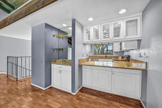 1905 Alga Rd Unit C, Carlsbad, CA 92009 - bar area with wood finished floors, range with electric stovetop, baseboards, recessed lighting, and beam ceiling