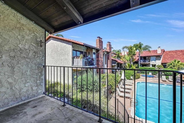 1905 Alga Rd Unit C, Carlsbad, CA 92009 - balcony featuring view of pool area