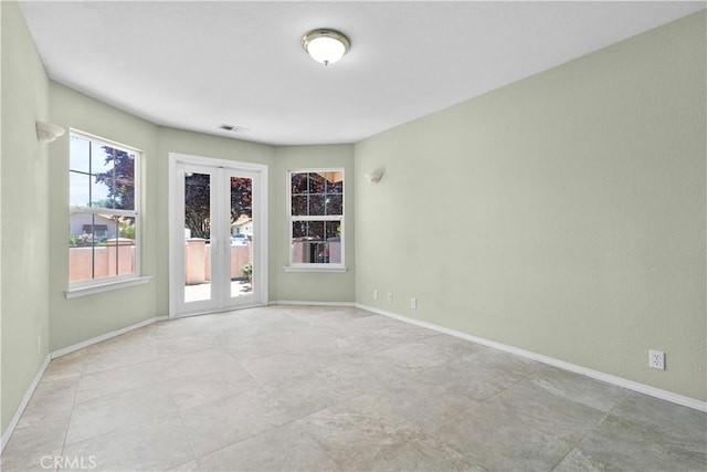 917 Saint Ann, Paso Robles, CA 93446 - empty room featuring french doors and baseboards