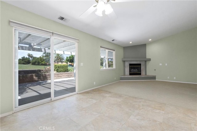 917 Saint Ann, Paso Robles, CA 93446 - unfurnished living room with a fireplace, baseboards, a ceiling fan, and recessed lighting