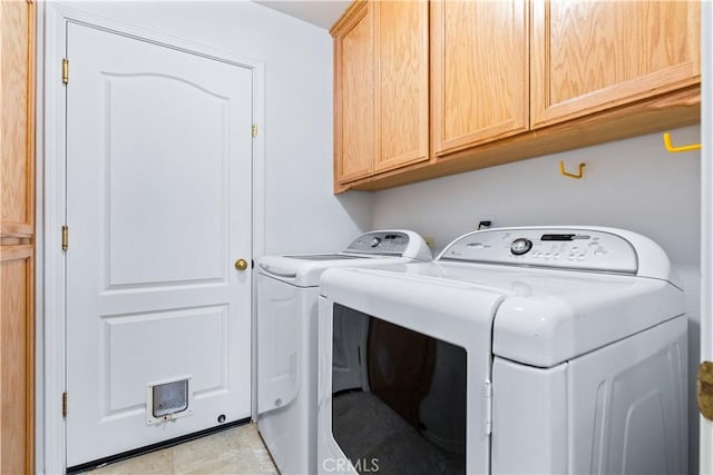 917 Saint Ann, Paso Robles, CA 93446 - washroom with washing machine and dryer, cabinet space, and light tile patterned floors