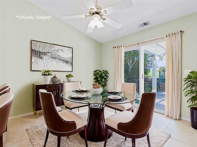 917 Saint Ann, Paso Robles, CA 93446 - dining space featuring vaulted ceiling, light tile patterned flooring, a ceiling fan, and baseboards
