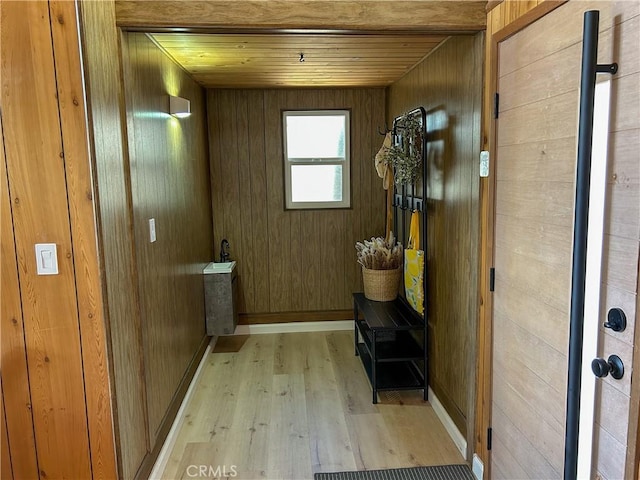 2484 Pine Dr, Running Springs, CA 92382 - mudroom with wood finished floors, wooden ceiling, wood walls, and baseboards
