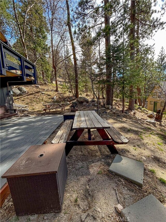 2484 Pine Dr, Running Springs, CA 92382 - view of yard featuring a wooden deck