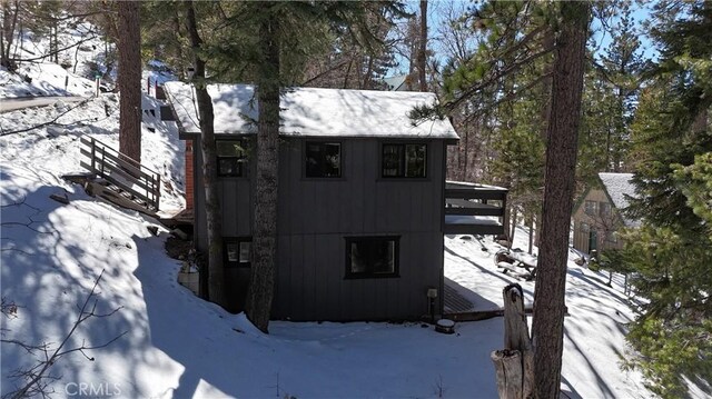 2484 Pine Dr, Running Springs, CA 92382 - view of snowy exterior