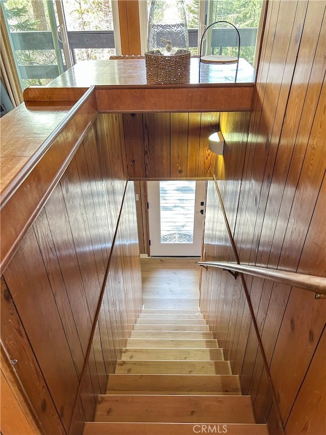 2484 Pine Dr, Running Springs, CA 92382 - stairs with hardwood / wood-style flooring and wooden walls
