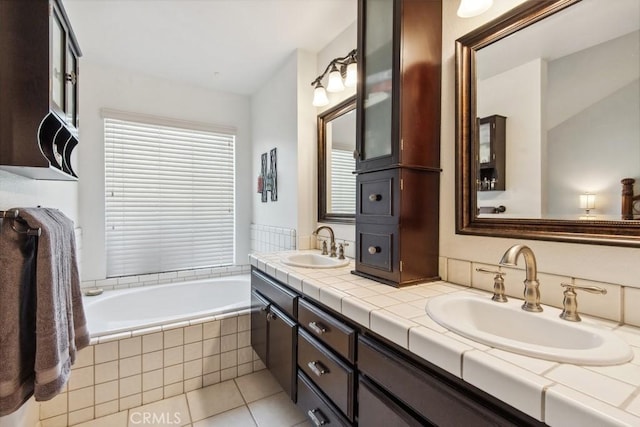 43650 Buckeye Rd, Temecula, CA 92592 - bathroom with double vanity, a bath, and tile patterned flooring