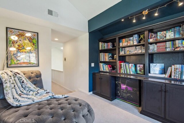 43650 Buckeye Rd, Temecula, CA 92592 - living area featuring vaulted ceiling and light colored carpet
