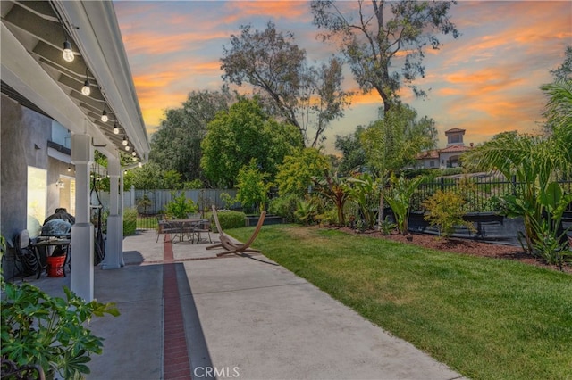 43650 Buckeye Rd, Temecula, CA 92592 - yard at dusk featuring a patio area