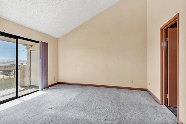 368 Travelodge Dr, El Cajon, CA 92020 - carpeted spare room featuring vaulted ceiling, a textured ceiling, and baseboards