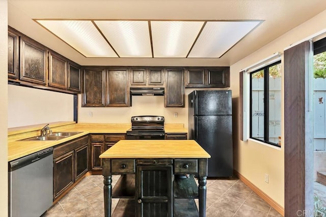 368 Travelodge Dr, El Cajon, CA 92020 - kitchen with freestanding refrigerator, range with electric stovetop, stainless steel dishwasher, under cabinet range hood, and light tile patterned flooring