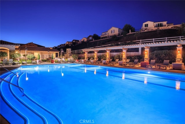 24923 Hearth Ct, Valencia, CA 91354 - pool at twilight featuring a community pool