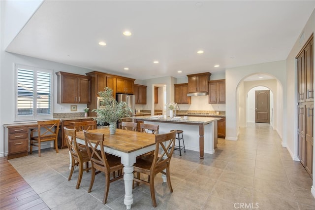 24923 Hearth Ct, Valencia, CA 91354 - dining space with recessed lighting and arched walkways