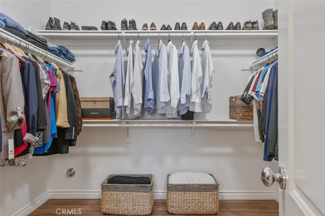 24923 Hearth Ct, Valencia, CA 91354 - spacious closet featuring wood finished floors