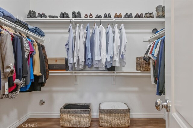 24923 Hearth Ct, Valencia, CA 91354 - walk in closet with wood finished floors