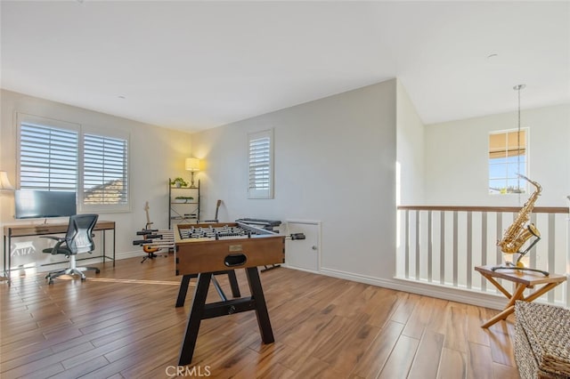 24923 Hearth Ct, Valencia, CA 91354 - rec room with an office area, wood finished floors, and healthy amount of natural light
